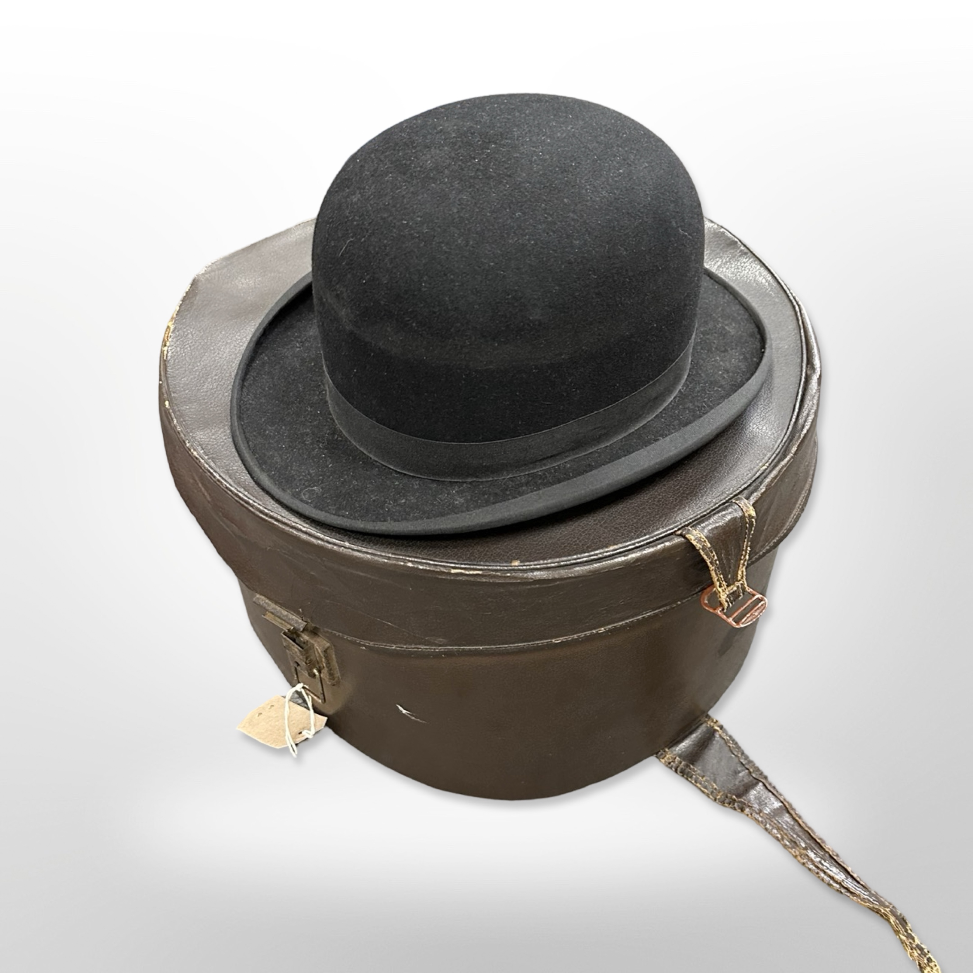 A gentleman's bowler hat by Norman Brooks Limited of Clayton Street, Newcastle on Tyne, size 7,