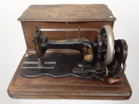 An antique hand sewing machine
