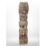 A carved totem pole figure, height 34cm.