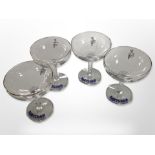 A set of four Babycham glasses, height 10.5cm.