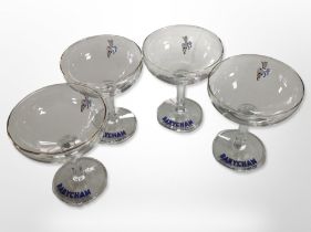 A set of four Babycham glasses, height 10.5cm.