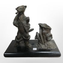A bronze desk stand depicting Puss in Boots, height 16cm.