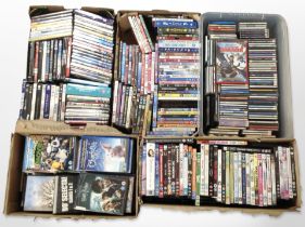 A large quantity of cds and dvds (5 boxes)