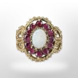 A 9ct yellow gold ruby and opal cluster ring, size M/N. CONDITION REPORT: 3.5g.