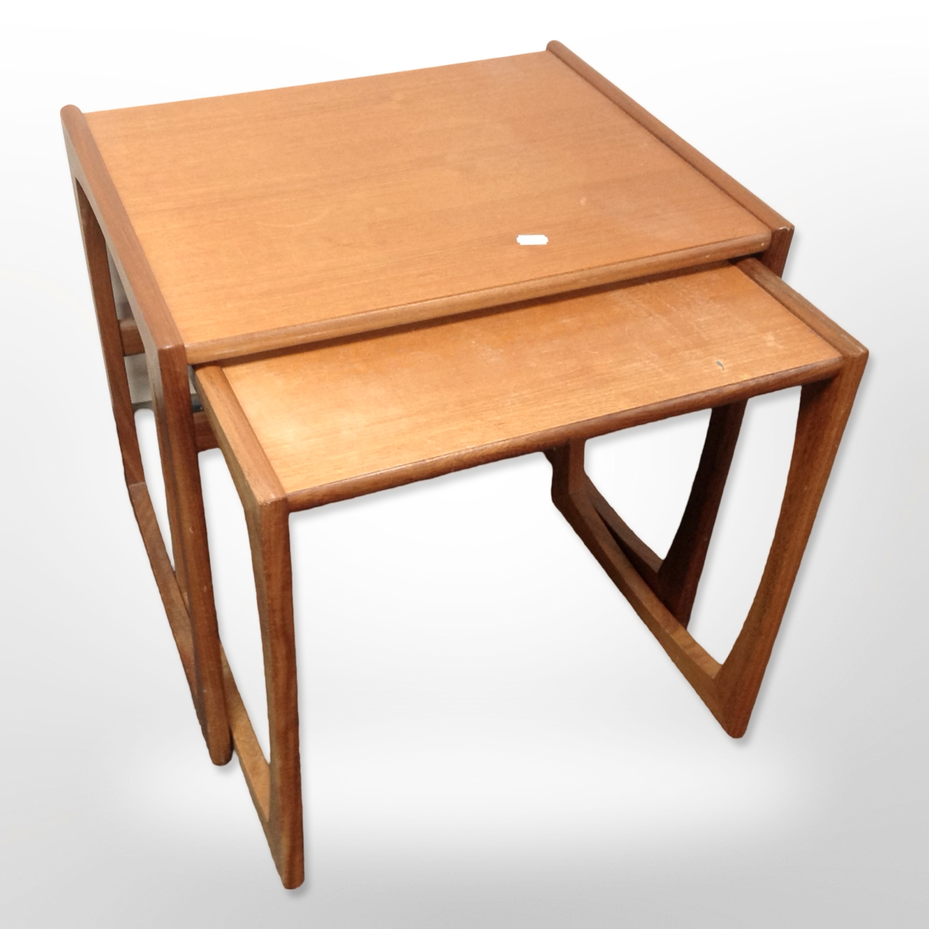 A G-plan teak nest of two tables,