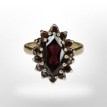 A 9ct yellow gold ruby cluster ring, size L. CONDITION REPORT: 3.3g.