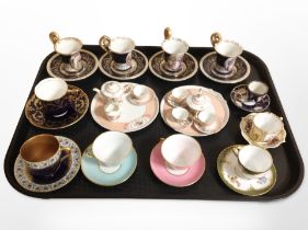 A set of four Dresden porcelain miniature tea cups and saucers,