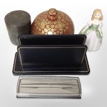 A group of items including Chinese cylindrical pewter tea caddy, Parker pen,