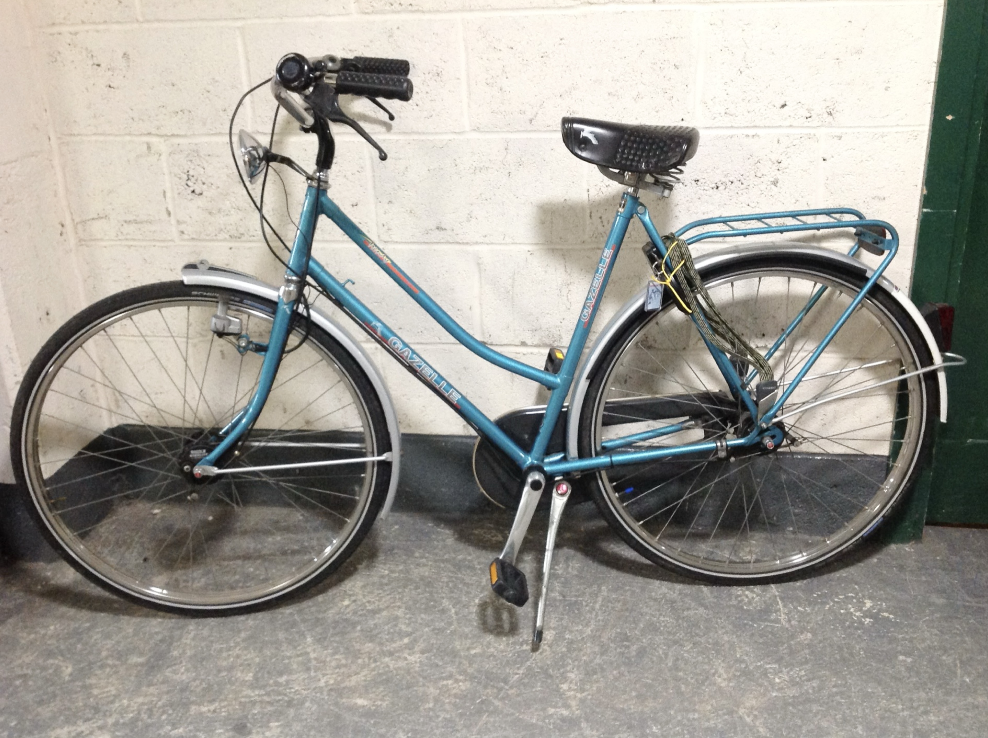 A lady's Gazelle bike frame 23'', Cafe lock with key, rear rack, mud guards, chain guard,