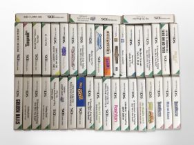 A quantity of Nintendo DS games.