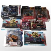 Eight Hasbro Transformers figurines, boxed.