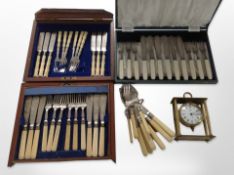 A mahogany canteen of fish cutlery, together with a further canteen, loose cutlery,