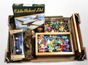 A Corgi Eddie Stobart die-cast Douglas DC-3 plane, a Burago model car, and other toys.