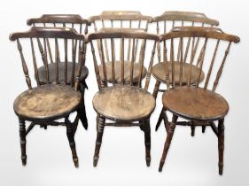A group of six non matching turned beech spindle backed chairs