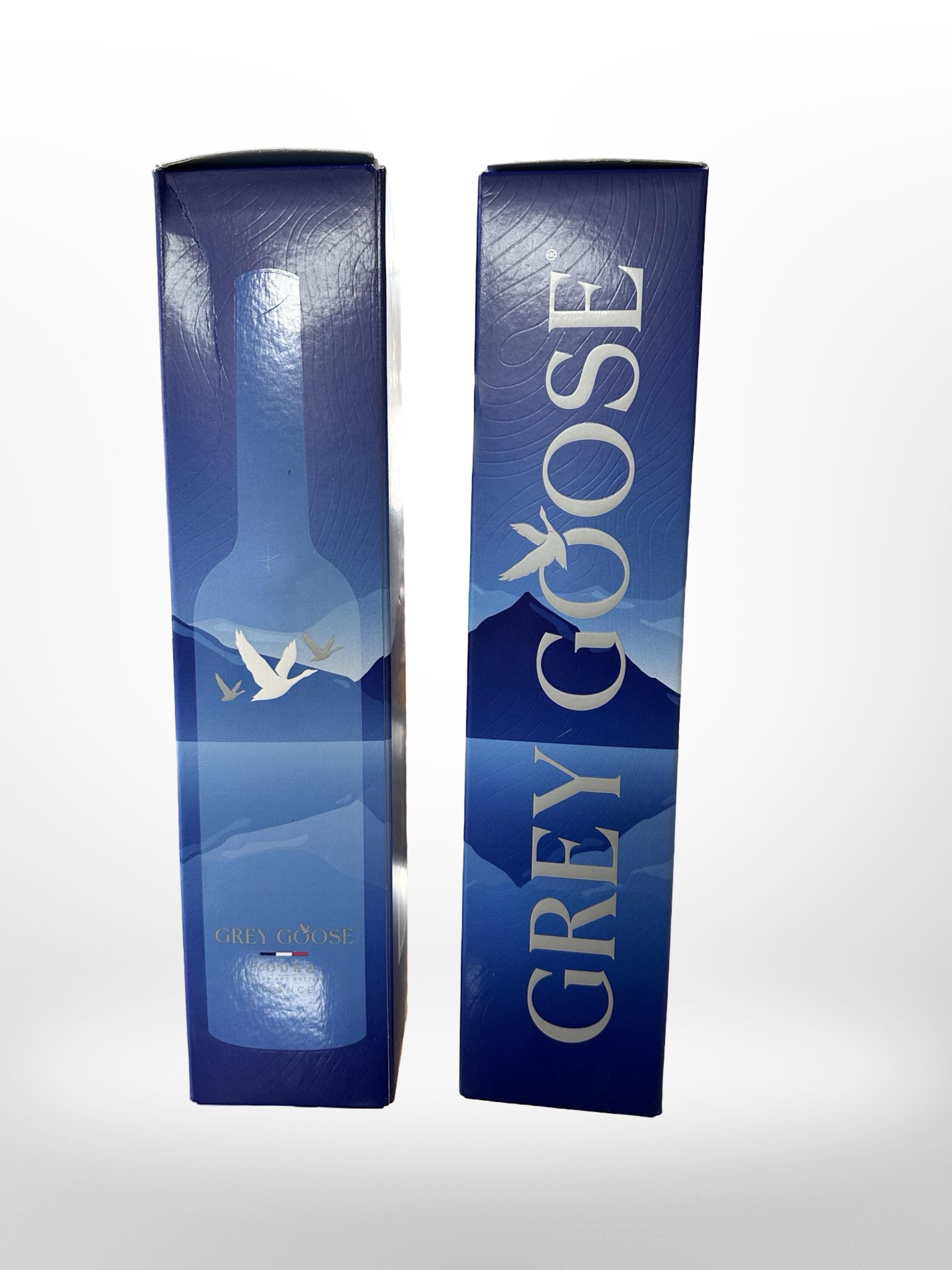 Two bottles of Grey Goose vodka, 700ml, 40% vol, in carton.