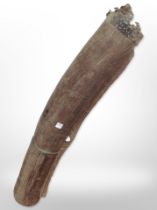 A carved wooden New Zealand dart holder,