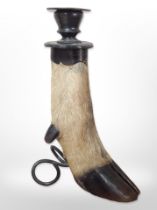 A deer's hoof candlestick,