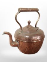 A Victorian copper kettle