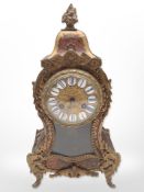 A 19th-century Boulle work tortoiseshell and brass-inlaid 8-day mantel clock, striking on a bell,