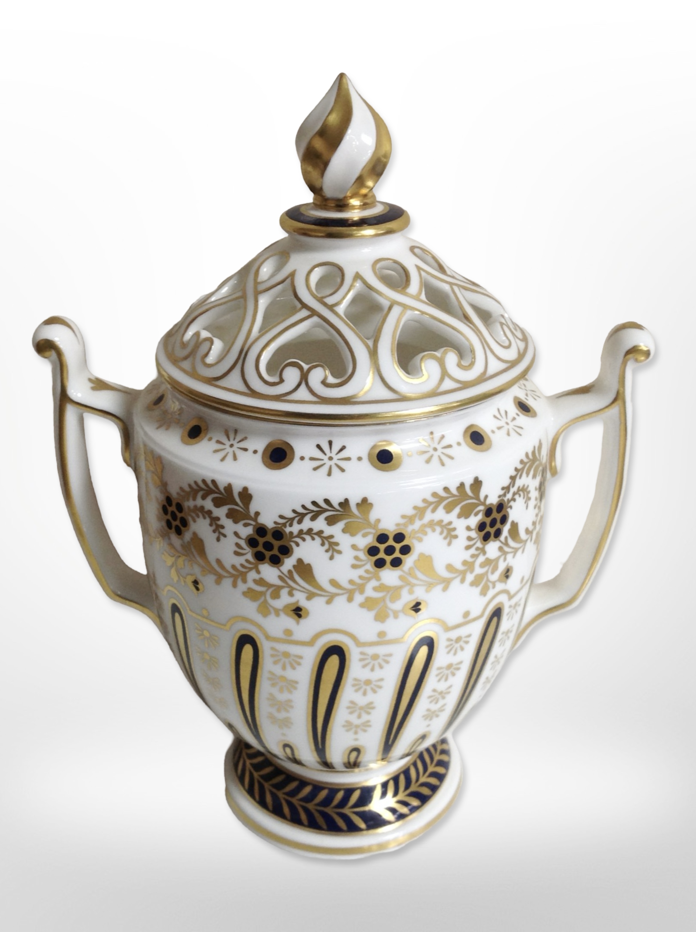 A Royal Worcester Worcester Heritage Collection twin-handled porcelain vase with pierced lid,
