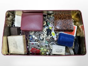 A large tin of costume jewellery (Q)