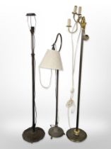 Three Continental patinated metal standard lamps