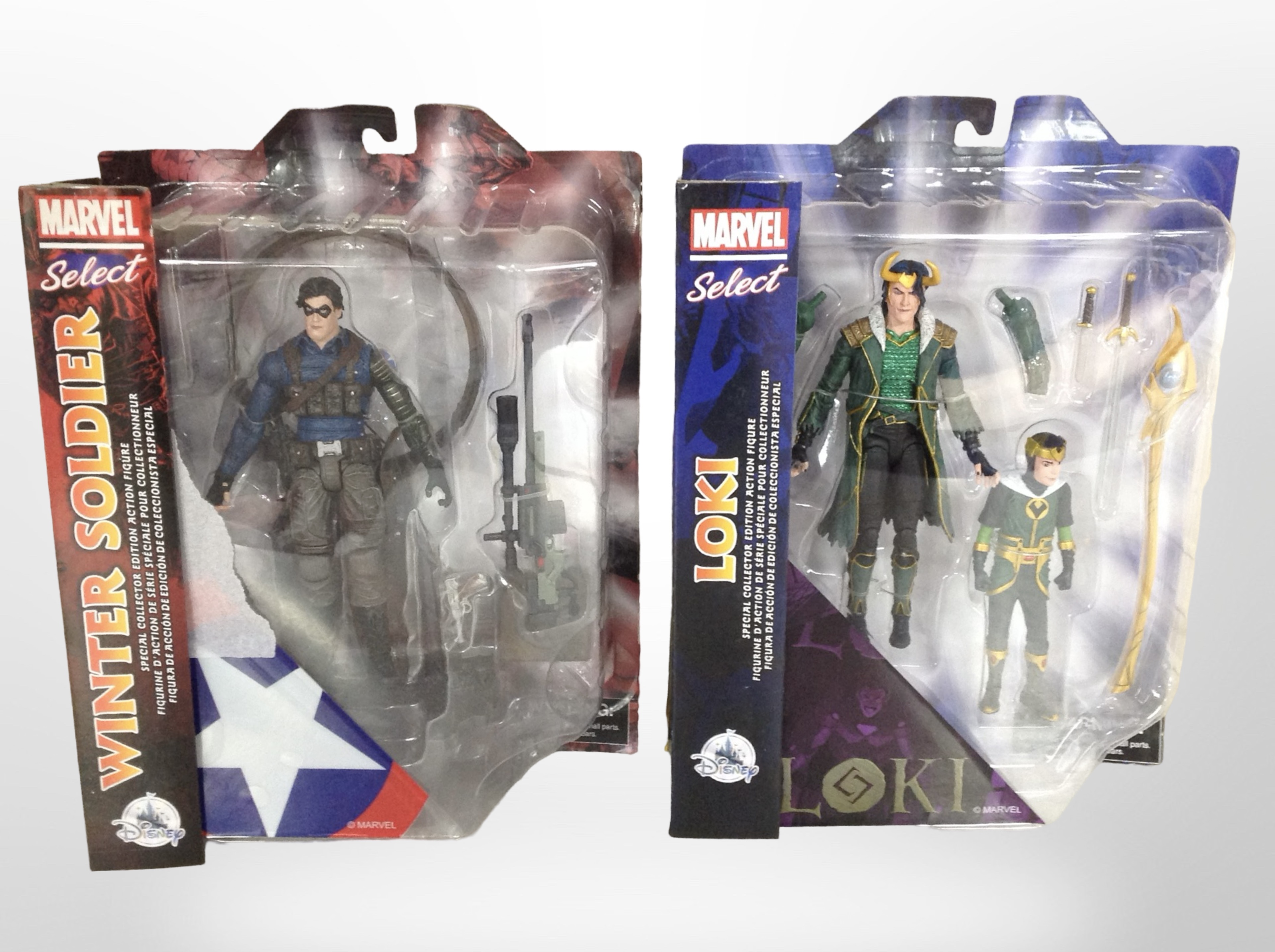 Two Marvel Select figurines, Loki and the Winter Soldier, boxed.