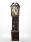 An oak Tempus Fugit longcase clock, with pendulum and weights,