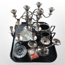 A group of silver plated table candleabra, further plated wares,