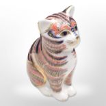 A Royal Crown Derby cat paperweight with gold stopper.