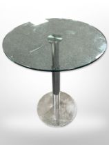 A contemporary circular glass pedestal bar table on chrome metal adjustable support,