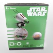 A Hasbro Disney Star Wars D-O interactive Bluetooth droid, in box.