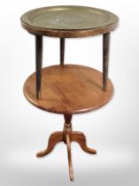 A reproduction mahogany occasional table and a further tripod table with engraved eastern brass