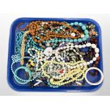 A group of costume jewellery, beaded necklaces,