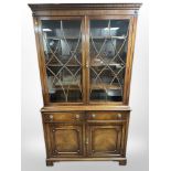 A good quality reproduction mahogany bookcase in the George III style,