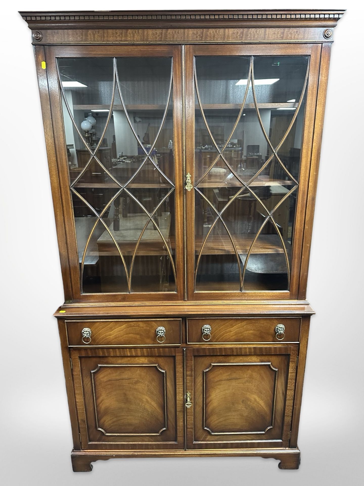 A good quality reproduction mahogany bookcase in the George III style,