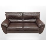 A contemporary stitched leather three seater settee,