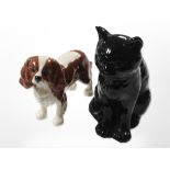 A Beswick spaniel and a Sylvac figure of a cat, tallest 17.5cm.