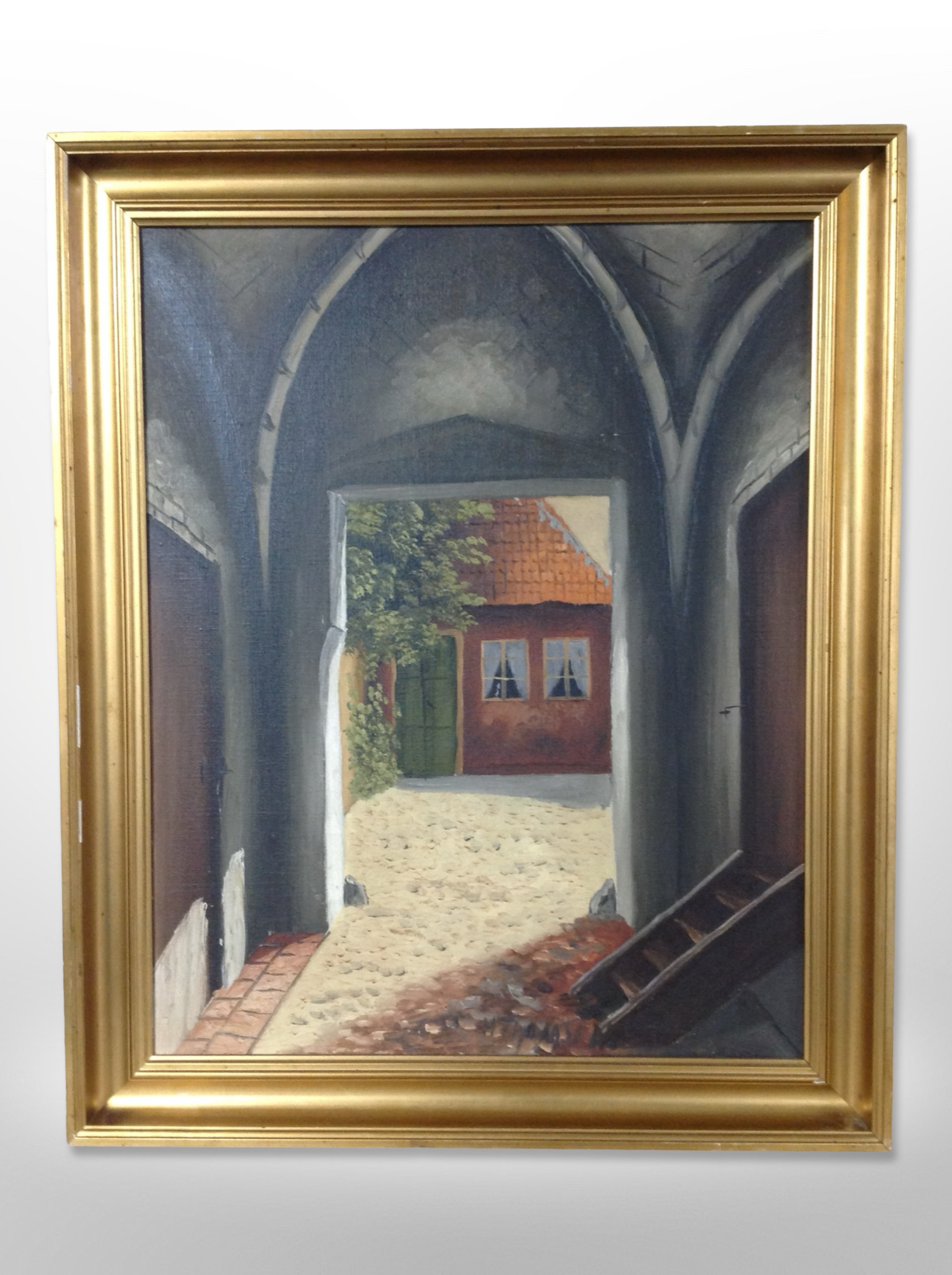 Continental school : View through an archway with cobbled pavement, oil on canvas, 58cm x 46cm.