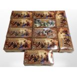 11 Arcane Legions miniatures booster packs containing figures and cards, all Egyptians.