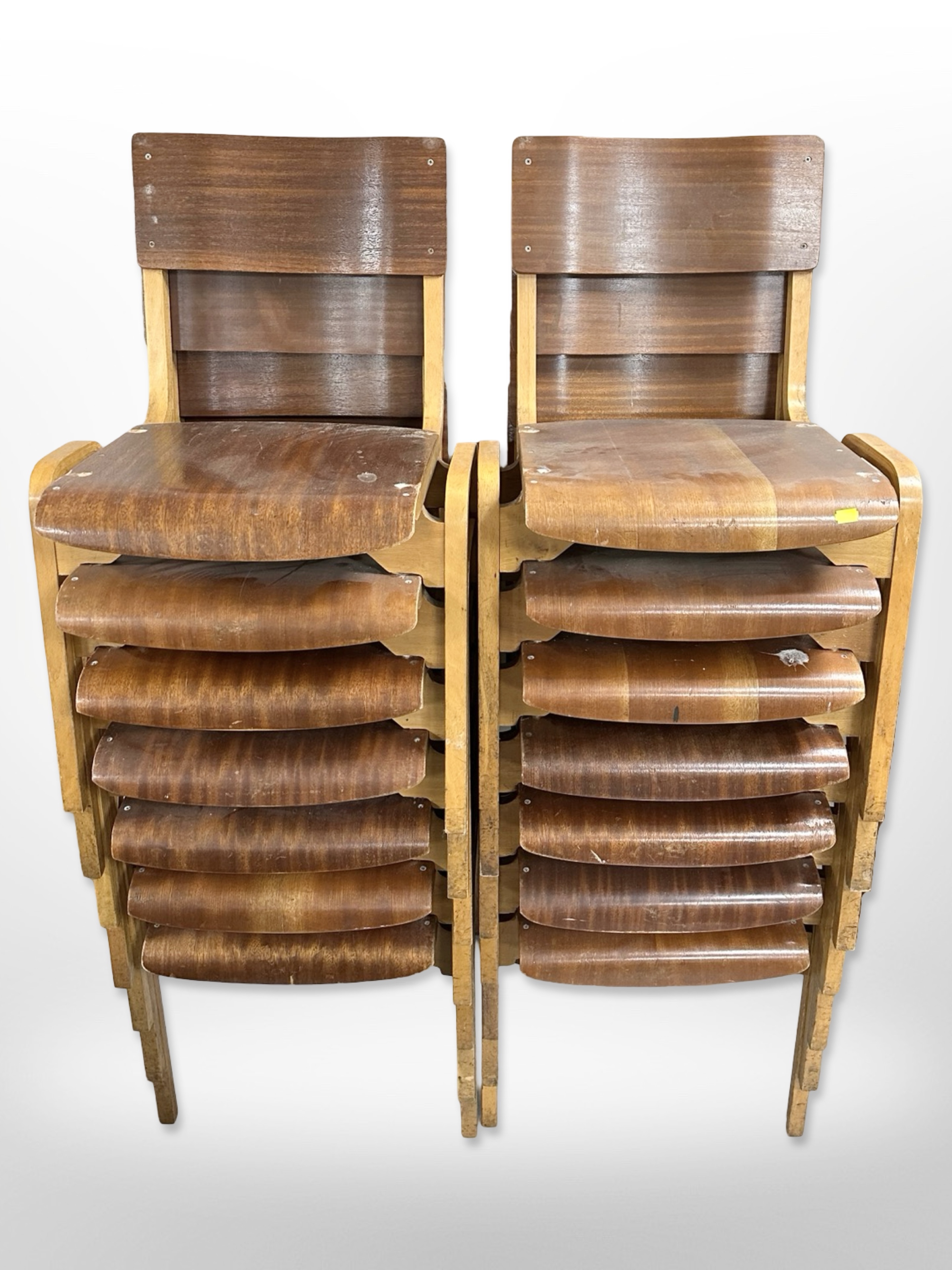 A set of fourteen 20th century laminated teak and bentwood stacking chairs,