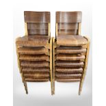 A set of fourteen 20th century laminated teak and bentwood stacking chairs,