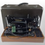 A Singer 201K electric sewing machine, No. EK674001, in case with lead, pedal, etc.