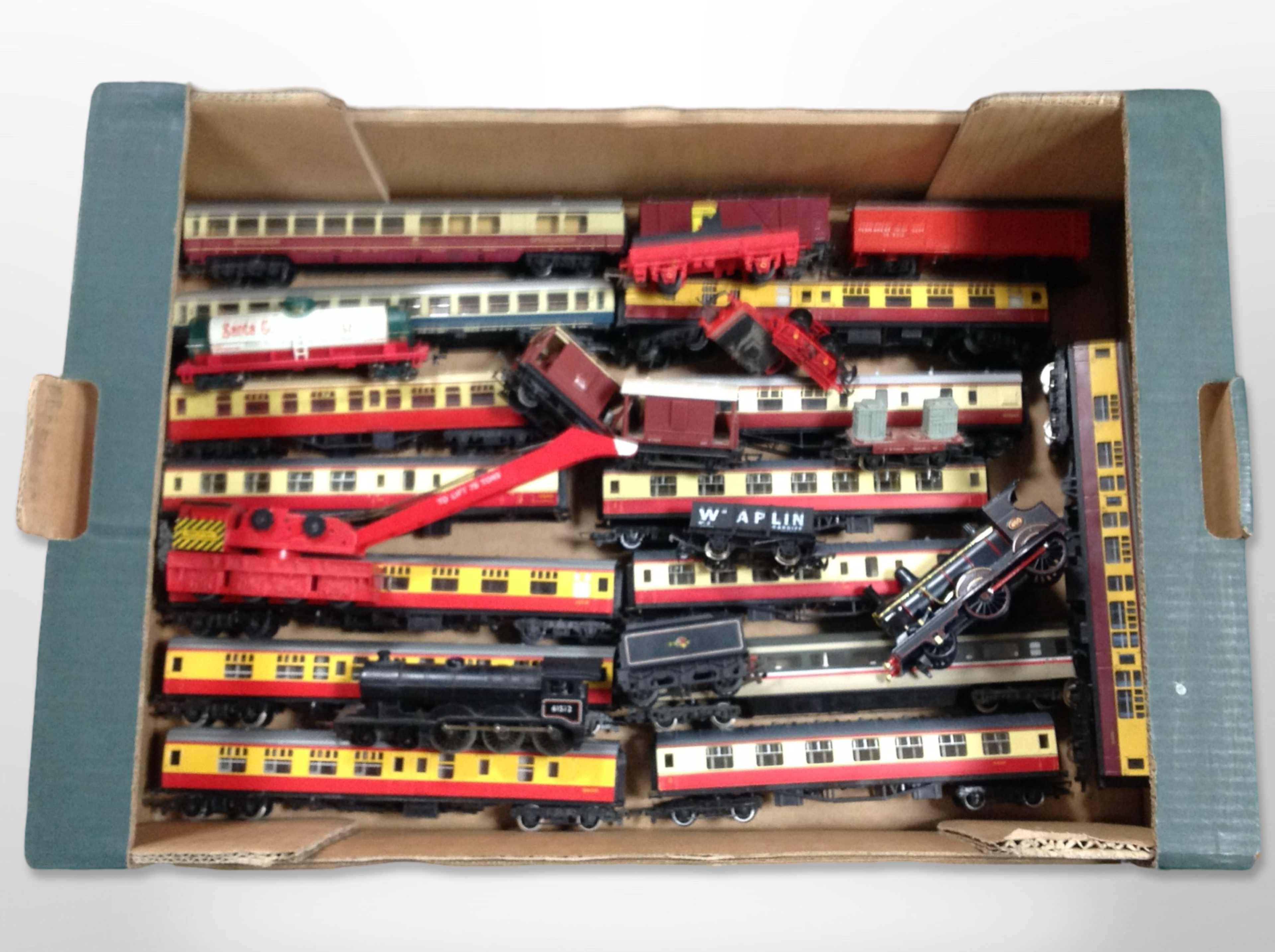 A collection of 00 gauge locomotives and passenger cars including Matchbox, Tri-ang, Hornby, etc.