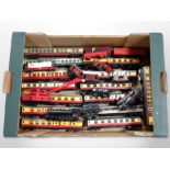 A collection of 00 gauge locomotives and passenger cars including Matchbox, Tri-ang, Hornby, etc.