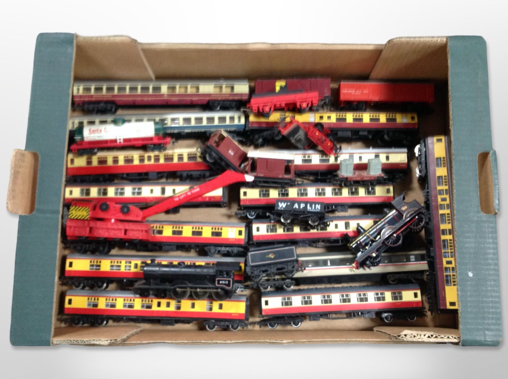 A collection of 00 gauge locomotives and passenger cars including Matchbox, Tri-ang, Hornby, etc.