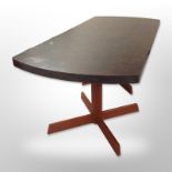 A contemporary MDF twin pedestal dining table with leather effect top,