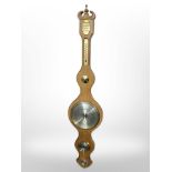 A Danish oak banjo barometer with silvered dial,