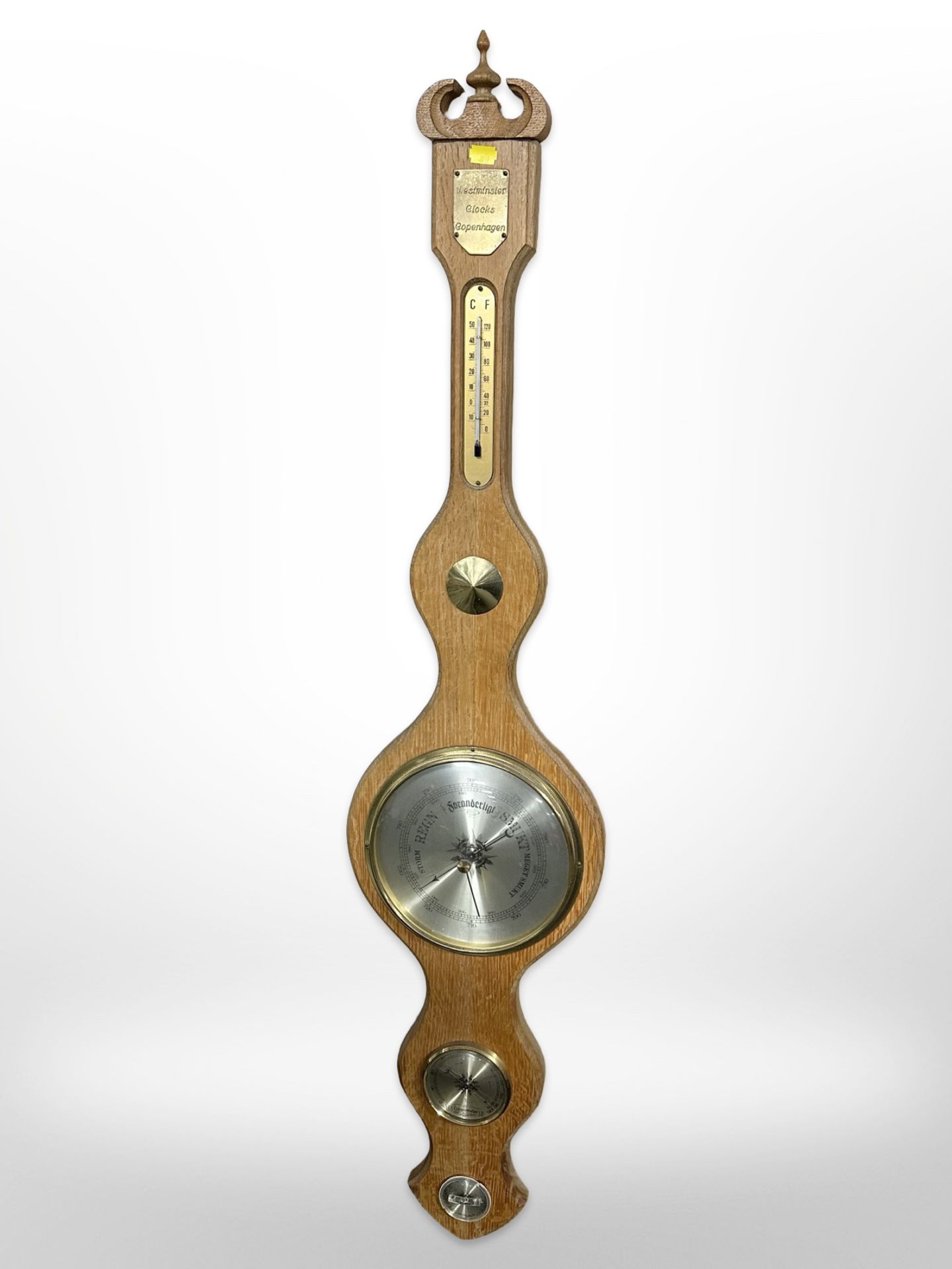 A Danish oak banjo barometer with silvered dial,