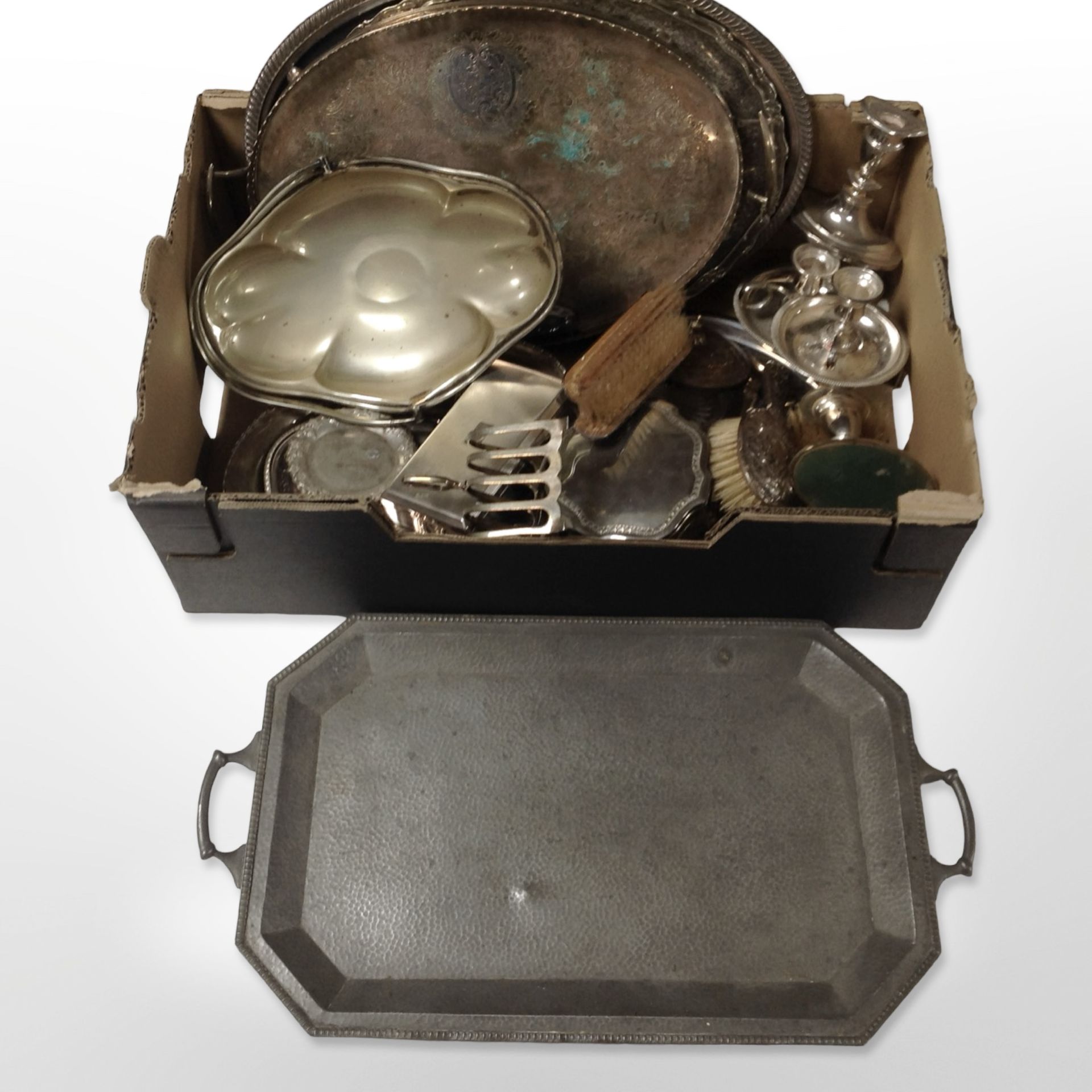 An Arts and Crafts hammered pewter twin-handled octagonal serving tray, width 55cm,